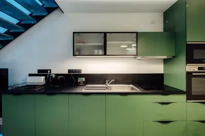 Cuisine ou kitchenette dans l'établissement L Atelier
