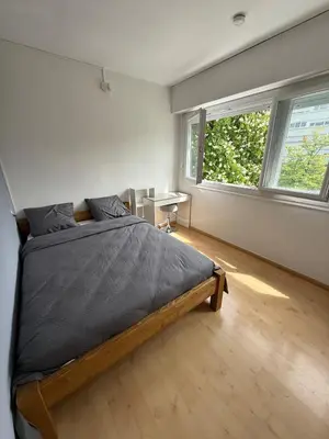 Un ou plusieurs lits dans un hébergement de l'établissement 4 bedroom apartment