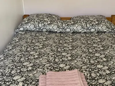 Un ou plusieurs lits dans un hébergement de l'établissement 4 bedroom apartment