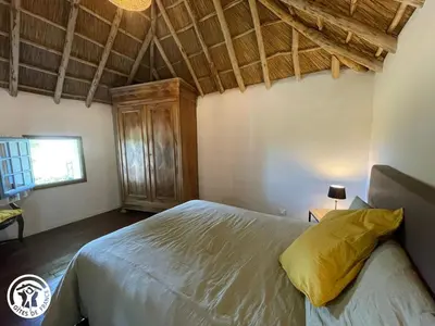 Un ou plusieurs lits dans un hébergement de l'établissement Séjour Authentique en Bourrines Traditionnelles à Beauvoir-sur-Mer - FR-1-426-583