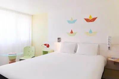 Un ou plusieurs lits dans un hébergement de l'établissement Greet Hôtel Saint-Nazaire Trignac Nouvelle Marque du Groupe Accor