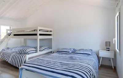 Un ou plusieurs lits dans un hébergement de l'établissement Beautiful Home In Saint Jean De Monts