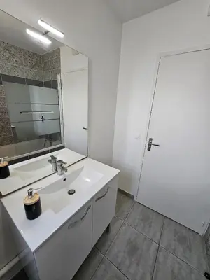 Salle de bains dans l'établissement Cozy Family