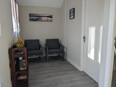 Coin salon dans l'établissement Chambres d'hôtes Le Cerisier