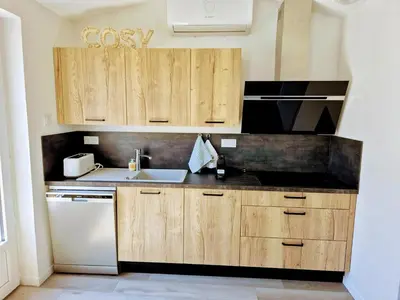 Cuisine ou kitchenette dans l'établissement Appartement 