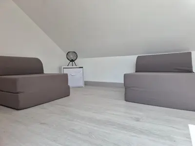 Coin salon dans l'établissement Maisonnette entre terre et mer