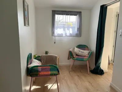 Coin salon dans l'établissement Cocon cosy entre terre & mer
