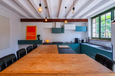 Cuisine ou kitchenette dans l'établissement Villa de La Plume