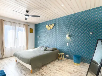 Un ou plusieurs lits dans un hébergement de l'établissement Holiday Home Confort et Relax Ile de Noirmoutier by Interhome