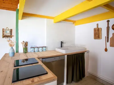 Cuisine ou kitchenette dans l'établissement Holiday Home Carpe Diem by Interhome