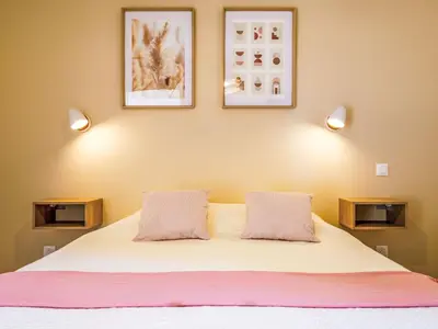 Un ou plusieurs lits dans un hébergement de l'établissement Holiday Home Ohana by Interhome
