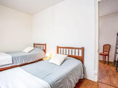 Un ou plusieurs lits dans un hébergement de l'établissement Holiday Home Sam-Suffi by Interhome