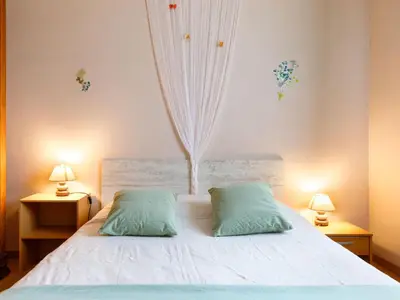 Un ou plusieurs lits dans un hébergement de l'établissement Holiday Home L'Horizon by Interhome