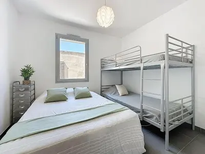 Un ou plusieurs lits dans un hébergement de l'établissement Holiday Home Les Embruns by Interhome