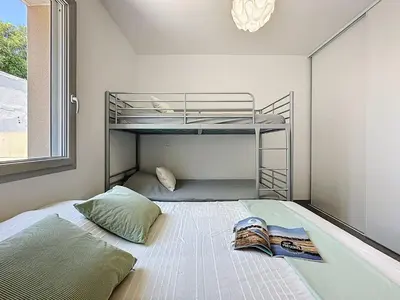 Un ou plusieurs lits dans un hébergement de l'établissement Holiday Home Les Embruns by Interhome