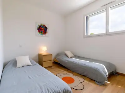 Un ou plusieurs lits dans un hébergement de l'établissement Holiday Home Le Pré Tarin by Interhome