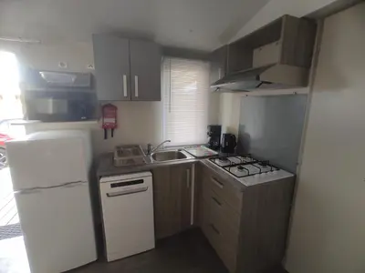 Cuisine ou kitchenette dans l'établissement Sol à gogo 3 Chambres à 50 m de la plage