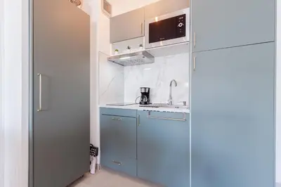 Cuisine ou kitchenette dans l'établissement L'Océanide - Vue mer - Parking