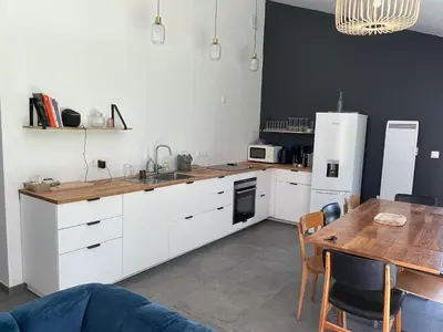 Cuisine ou kitchenette dans l'établissement La Grange maen