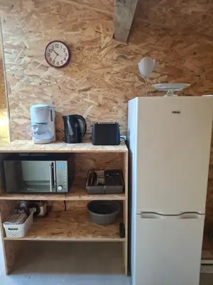 Cuisine ou kitchenette dans l'établissement Chez Marie