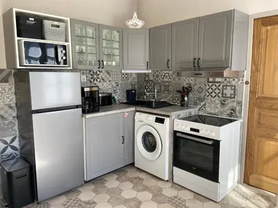 Cuisine ou kitchenette dans l'établissement L'Orangerie