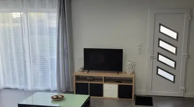 Télévision ou salle de divertissement dans l'établissement Gite casson