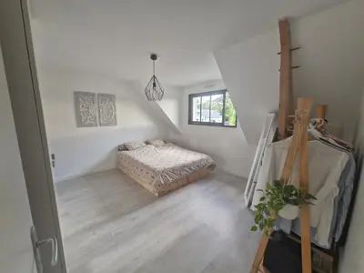 Un ou plusieurs lits dans un hébergement de l'établissement VILLA Plage&Piscine&Lac