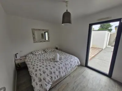 Un ou plusieurs lits dans un hébergement de l'établissement VILLA Plage&Piscine&Lac