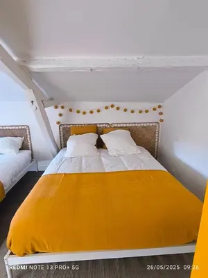 Un ou plusieurs lits dans un hébergement de l'établissement Le Gîte des Capucines - Cosy - 20mn du Parc