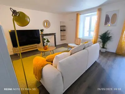 Télévision ou salle de divertissement dans l'établissement Le Gîte des Capucines - Cosy - 20mn du Parc