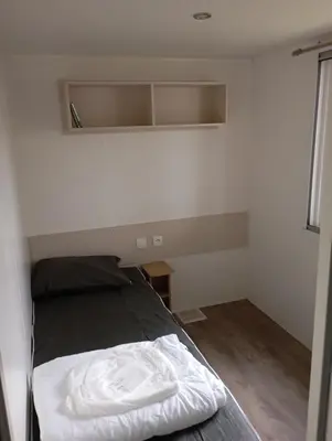 Un ou plusieurs lits dans un hébergement de l'établissement Mobilhome L'abri Côtier