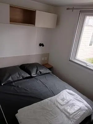 Un ou plusieurs lits dans un hébergement de l'établissement Mobilhome L'abri Côtier