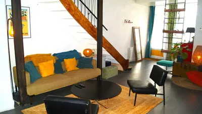 Coin salon dans l'établissement Charme de l ancien et confort moderne