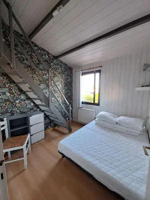 Un ou plusieurs lits dans un hébergement de l'établissement Charmante maison de vacances proche plage Saint Hilaire de Riez, Vendée
