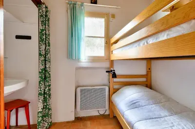 Un ou plusieurs lits dans un hébergement de l'établissement Maison pour 6 adultes 4 enfants à 100m de la plage