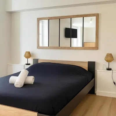 Un ou plusieurs lits dans un hébergement de l'établissement Studio Cosy - Doutre Centre Angers