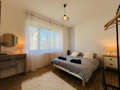 Un ou plusieurs lits dans un hébergement de l'établissement Casa Belfort - T2