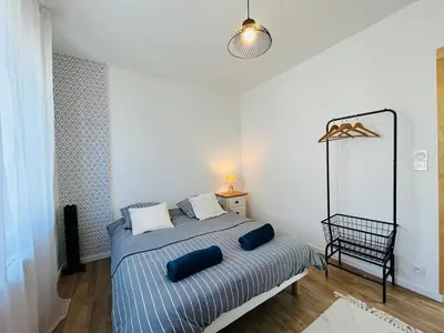 Un ou plusieurs lits dans un hébergement de l'établissement Casa Belfort - T2