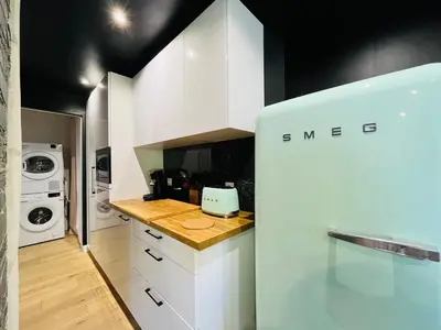 Cuisine ou kitchenette dans l'établissement Casa Belfort - T3