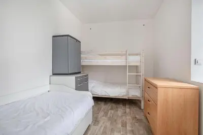 Un ou plusieurs lits dans un hébergement de l'établissement Maison pour 5 à 350m de la plage