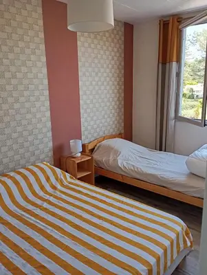 Un ou plusieurs lits dans un hébergement de l'établissement Maison St jean de monts 500 m de la plage