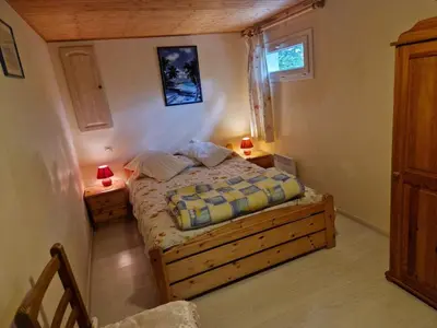 Un ou plusieurs lits dans un hébergement de l'établissement Gite villa Diana piscine