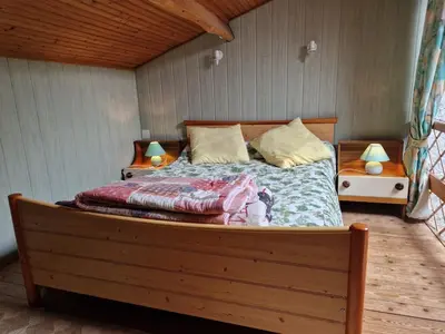Un ou plusieurs lits dans un hébergement de l'établissement Gite villa Diana piscine