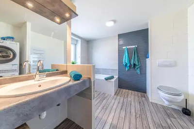 Salle de bains dans l'établissement Gîte Honorus - SPA - Puy duFou - Grande capacité
