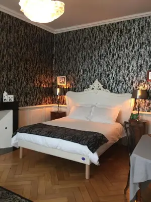 Un ou plusieurs lits dans un hébergement de l'établissement La Maison D'Hôtes Nantes Centre