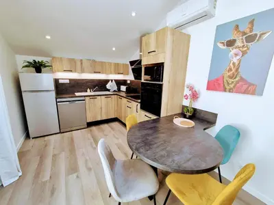 Cuisine ou kitchenette dans l'établissement Appartement 