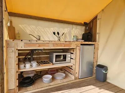 Cuisine ou kitchenette dans l'établissement Quiétude & Nature