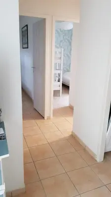 Un ou plusieurs lits dans un hébergement de l'établissement Maison de plain pied dans un parc paisible