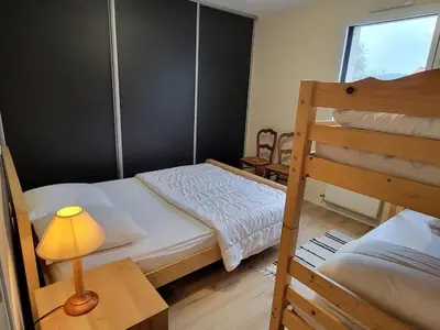 Un ou plusieurs lits dans un hébergement de l'établissement Gîte l'AUBEPINE, Les Herbiers centre