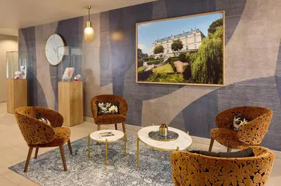 Coin salon dans l'établissement Quality Aparthotel Cholet